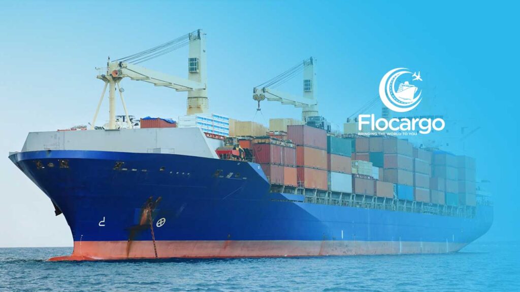 sea freight services on course with a ship filled with containers at sea
