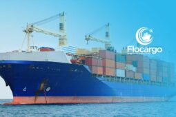 sea freight services on course with a ship filled with containers at sea
