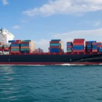 A container ship providing reliable shipping from China to Nigeria, managed by Flocargo