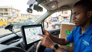 A delivery driver operating IoT last-mile delivery tracking dashboard