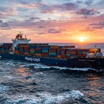 Cargo container ship traversing the ocean for international logistics between Taiwan and Nigeria.